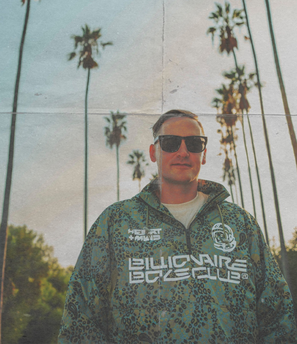 Jonathan Christiansen beneath Los Angeles palms